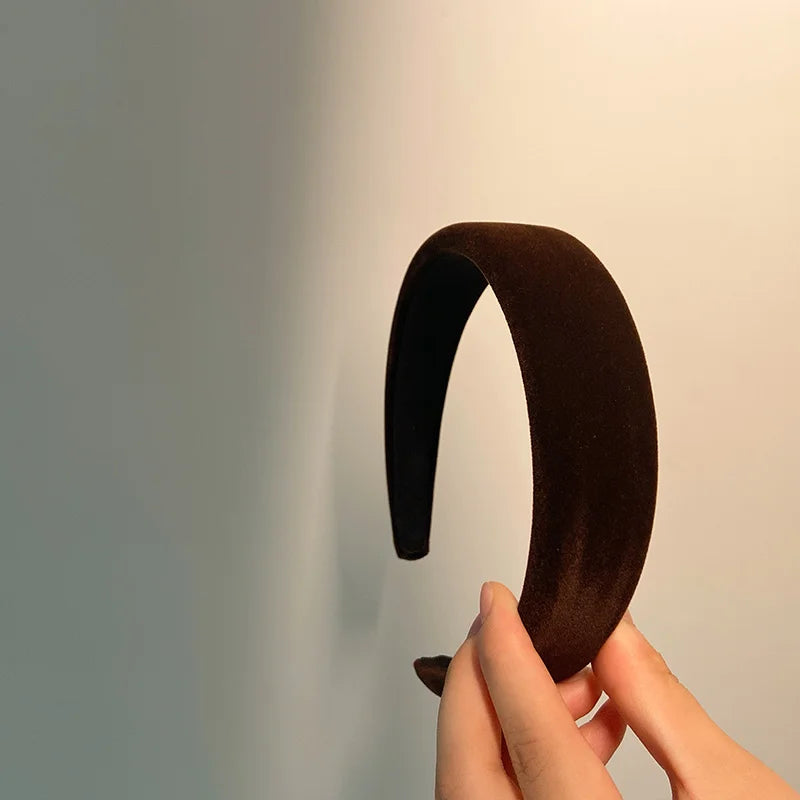 Fløyelspolstret vinterpannebånd