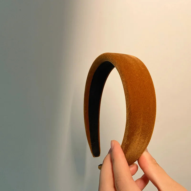 Fløyelspolstret vinterpannebånd