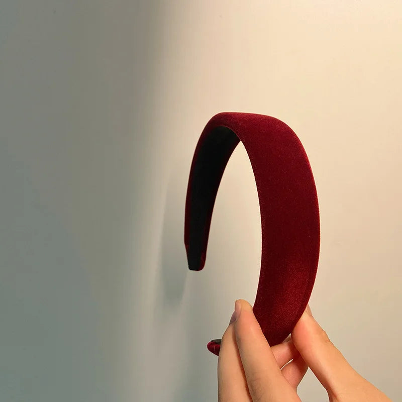 Fløyelspolstret vinterpannebånd