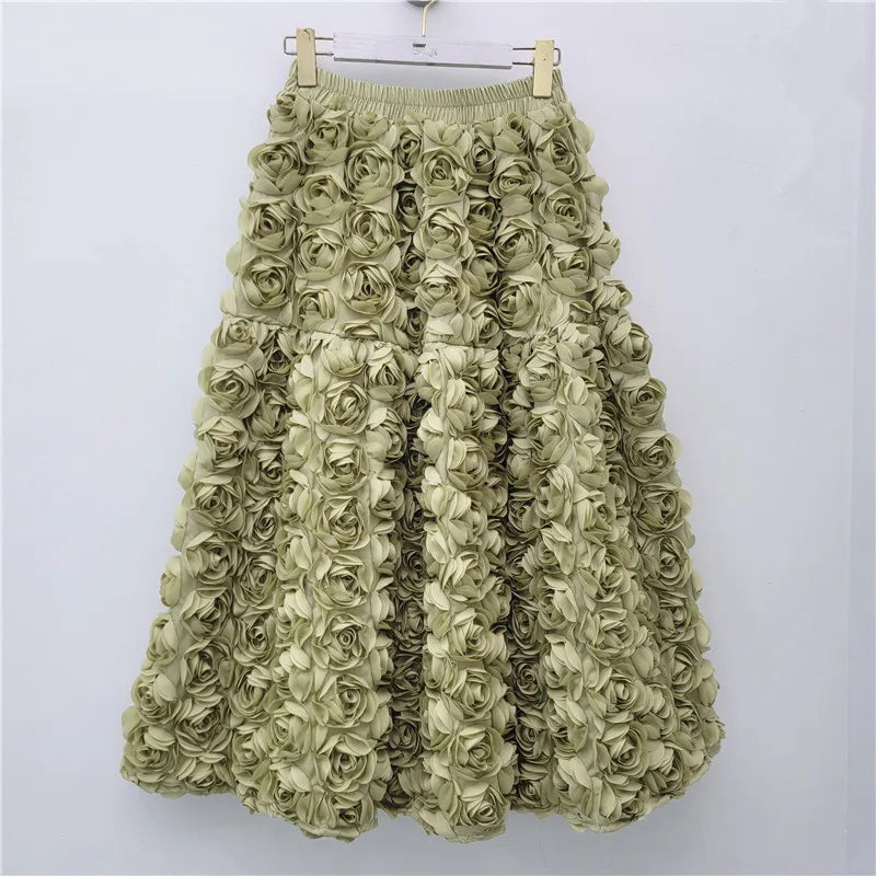 Falda para mujer Verano 2025 Versátil Flor tridimensional Falda a media pantorrilla Cintura alta Gran vuelo Moda Faldas largas estilo A
