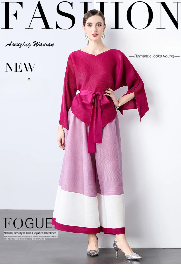 Conjunto de dos piezas de moda femenina para primavera, top suelto plisado irregular con retazos y cinturón, y pantalones de pierna ancha Miyake 2024