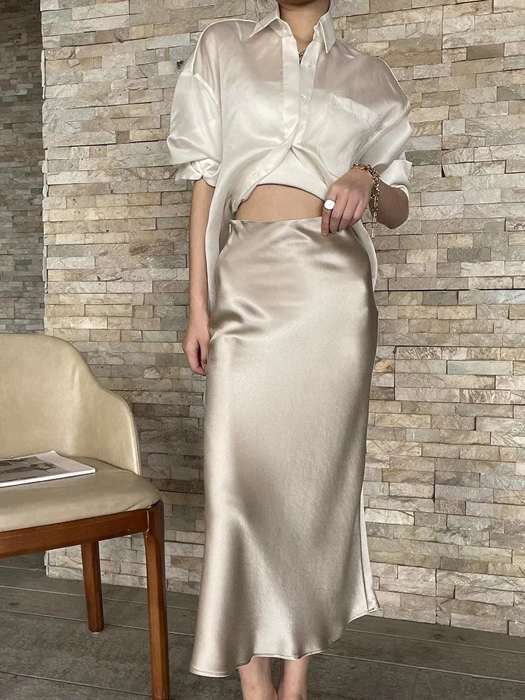 Faldas de satén de seda para mujer estilo coreano color champán para oficina, cintura alta, falda acampanada, moda elegante, falda lápiz larga sólida 2025