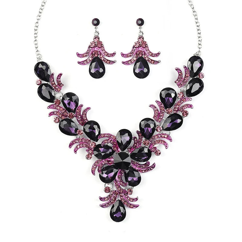Juego de joyería morada al por mayor Accesorios de boda Lujo Cristal Rhinestone Flor Pendientes y Collar llamativos para mujer