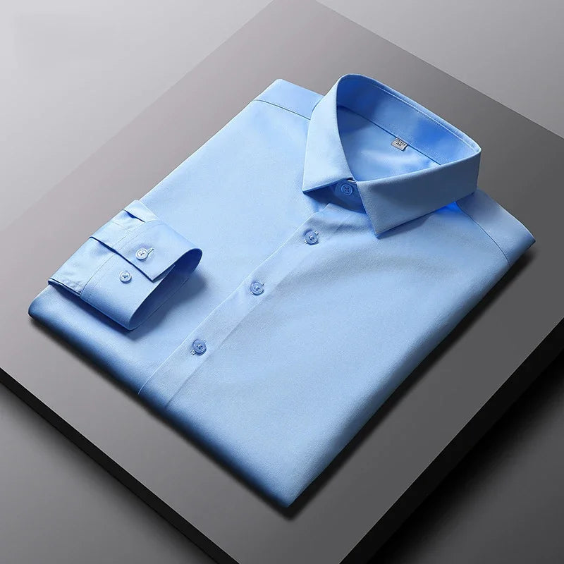 Camisa de manga larga de color liso para hombre, informal y a la moda, que no necesita planchado y es resistente a las arrugas, top de negocios