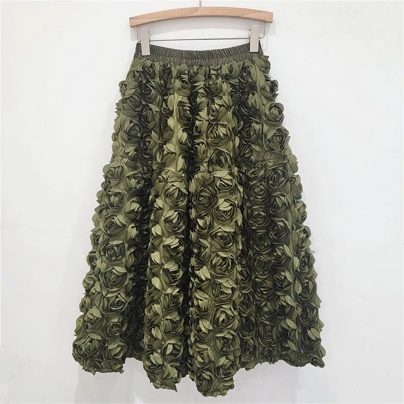 Falda para mujer Verano 2025 Versátil Flor tridimensional Falda a media pantorrilla Cintura alta Gran vuelo Moda Faldas largas estilo A