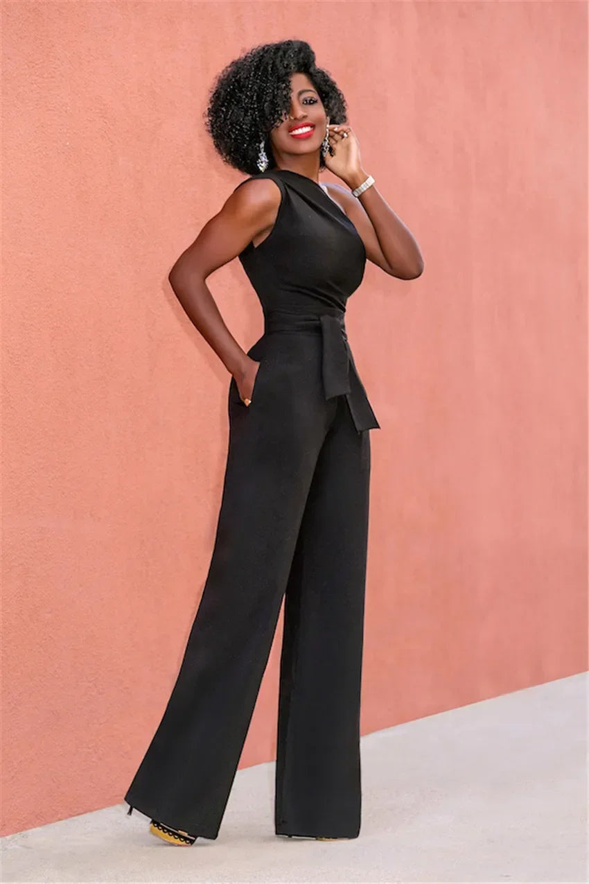 Damejumpsuit Ensfarget Skjev Krage Avskåret Topp Rette Bukser Belte Sexy Ermeløs Løse Bukser Elegant Sjarmerende Playsuits