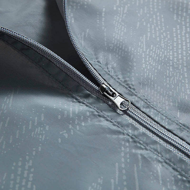 Chaqueta de senderismo impermeable para hombre y mujer JNLN, de secado rápido, cortavientos con protección solar, para acampada, caza, escalada y actividades al aire libre