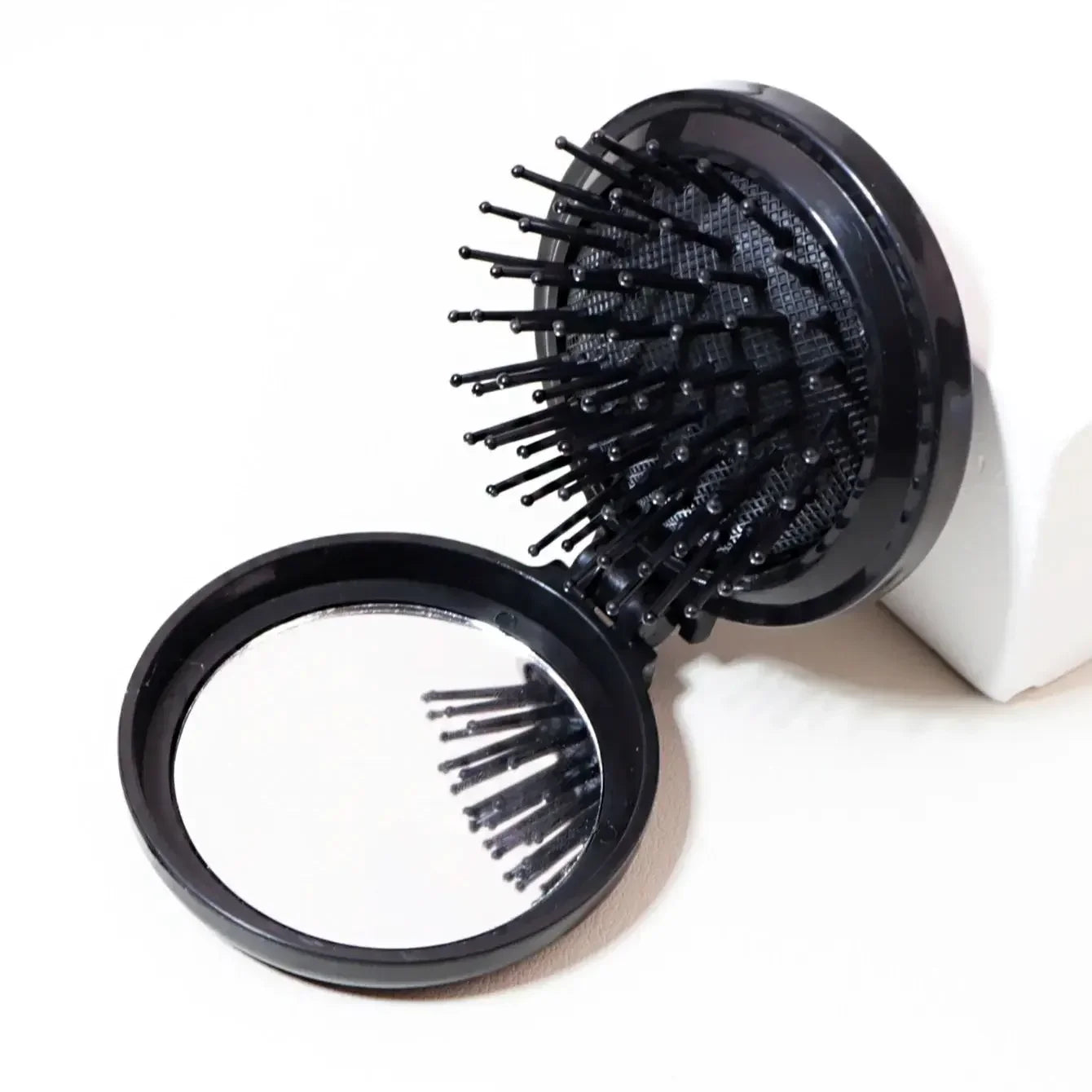 1 pieza Mini masajeador de cabeza plegable espejo antiestático accesorios de peinado cepillo de pelo portátil de viaje peine especial para pelucas de pelo real