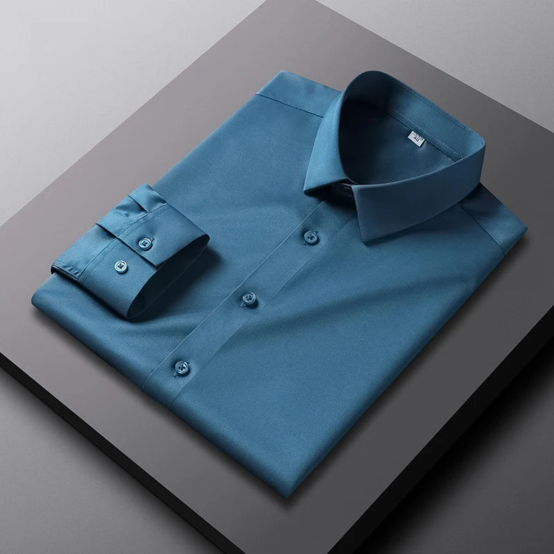 Camisa de manga larga de color liso para hombre, informal y a la moda, que no necesita planchado y es resistente a las arrugas, top de negocios