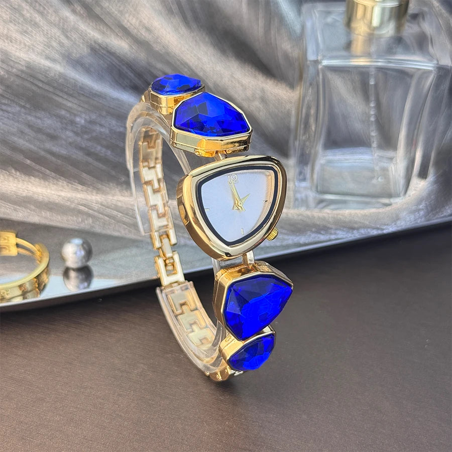 Reloj de cuarzo vanguardista de moda con esfera de patrón solar simple, pedrería brillante de forma irregular y diseño especial para mujer