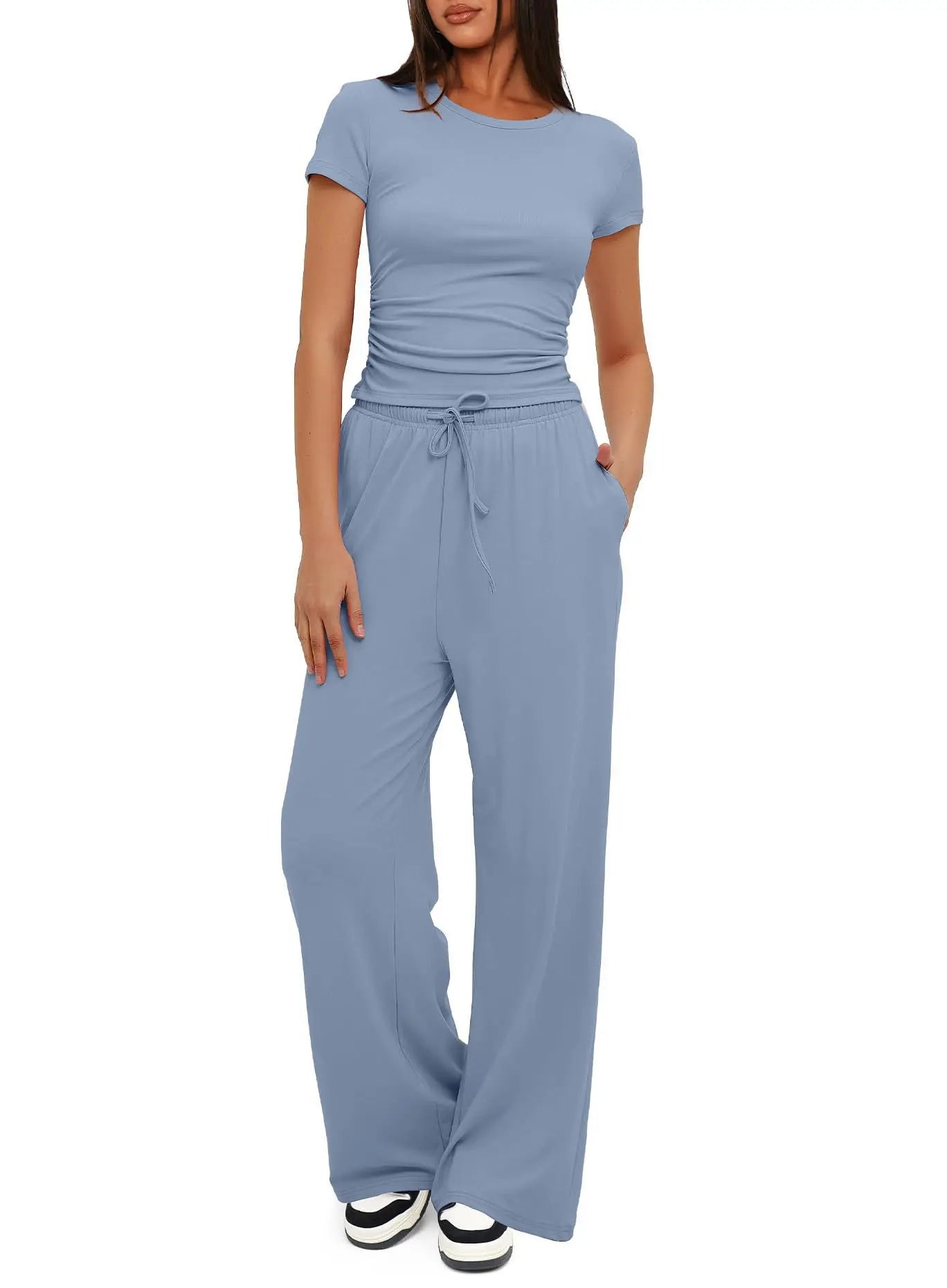 Conjunto de dos piezas de moda para mujer con top plisado de manga corta para comodidad informal y pantalones deportivos de pernera ancha y cintura alta