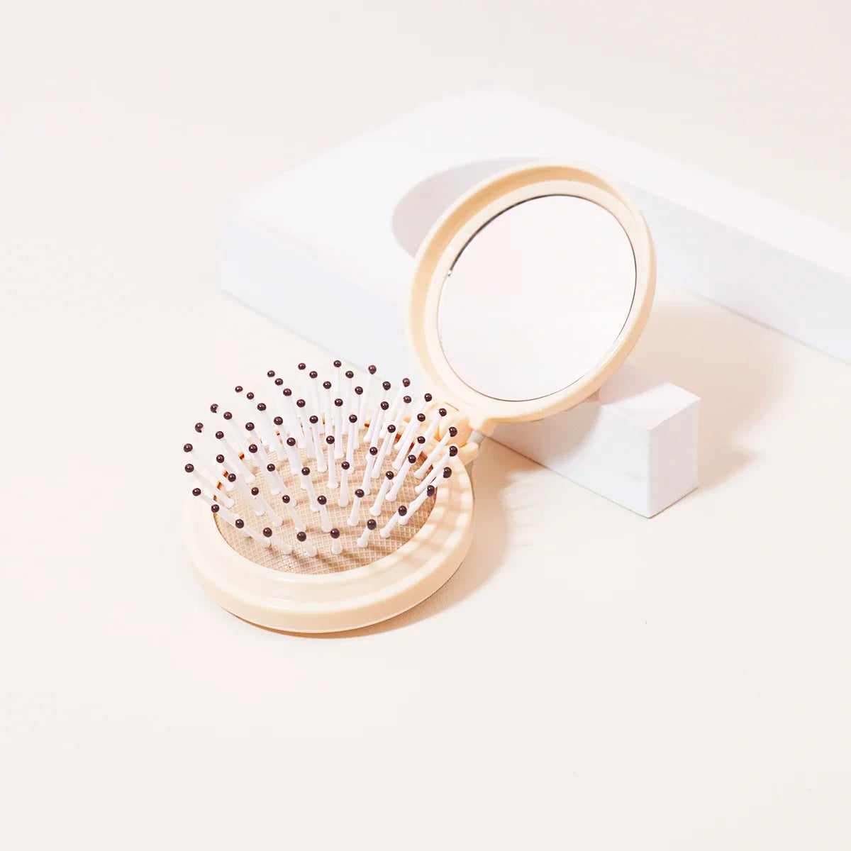 1 pieza Mini masajeador de cabeza plegable espejo antiestático accesorios de peinado cepillo de pelo portátil de viaje peine especial para pelucas de pelo real