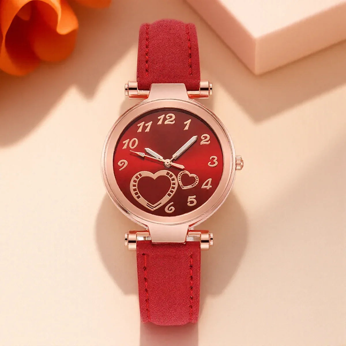 Montre à quartz tendance pour femme, motif cœur pêche, bracelet en cuir givré, style décontracté, cadeau idéal.