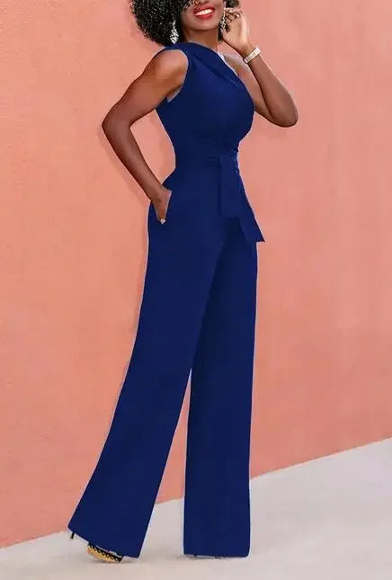 Damejumpsuit Ensfarget Skjev Krage Avskåret Topp Rette Bukser Belte Sexy Ermeløs Løse Bukser Elegant Sjarmerende Playsuits