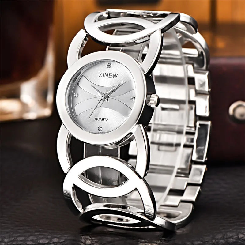 Mujeres Marca Grande Original XINEW 6438 Relojes Señoras Casual Dorado Lujo Cuarzo Pulsera Reloj Relogios Feminino Modas 2024