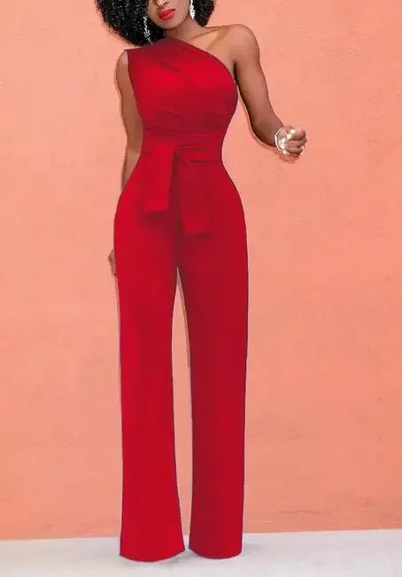 Damejumpsuit Ensfarget Skjev Krage Avskåret Topp Rette Bukser Belte Sexy Ermeløs Løse Bukser Elegant Sjarmerende Playsuits