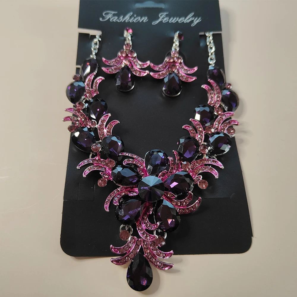 Juego de joyería morada al por mayor Accesorios de boda Lujo Cristal Rhinestone Flor Pendientes y Collar llamativos para mujer