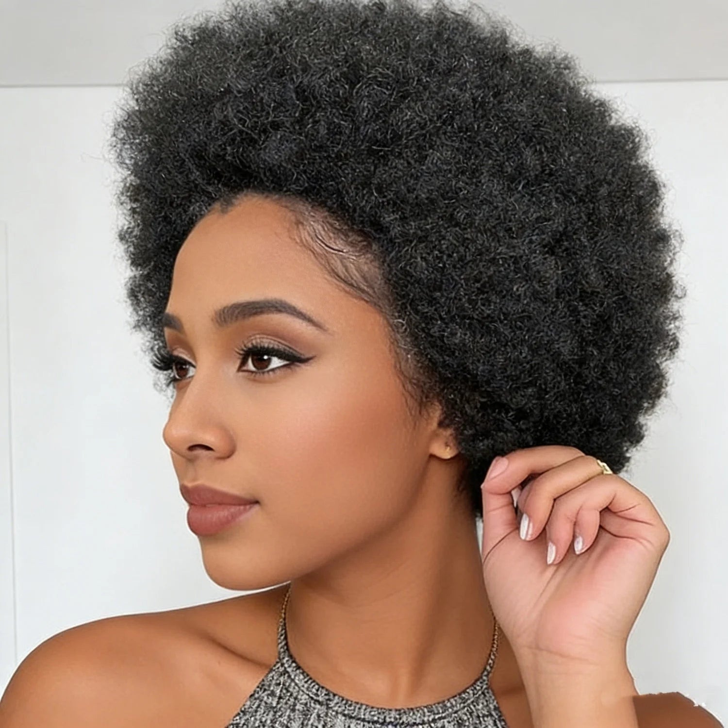 Perruque afro bouclée en forme de chignon (puff)