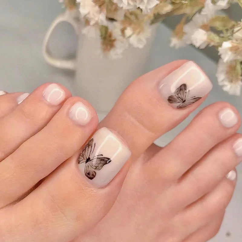 Flores Blancas Uñas Postizas Artificiales Francesas Nude Rosa Uñas Falsas para Pies con Pegamento Uñas Postizas Cortas Planas para Pies al por Mayor