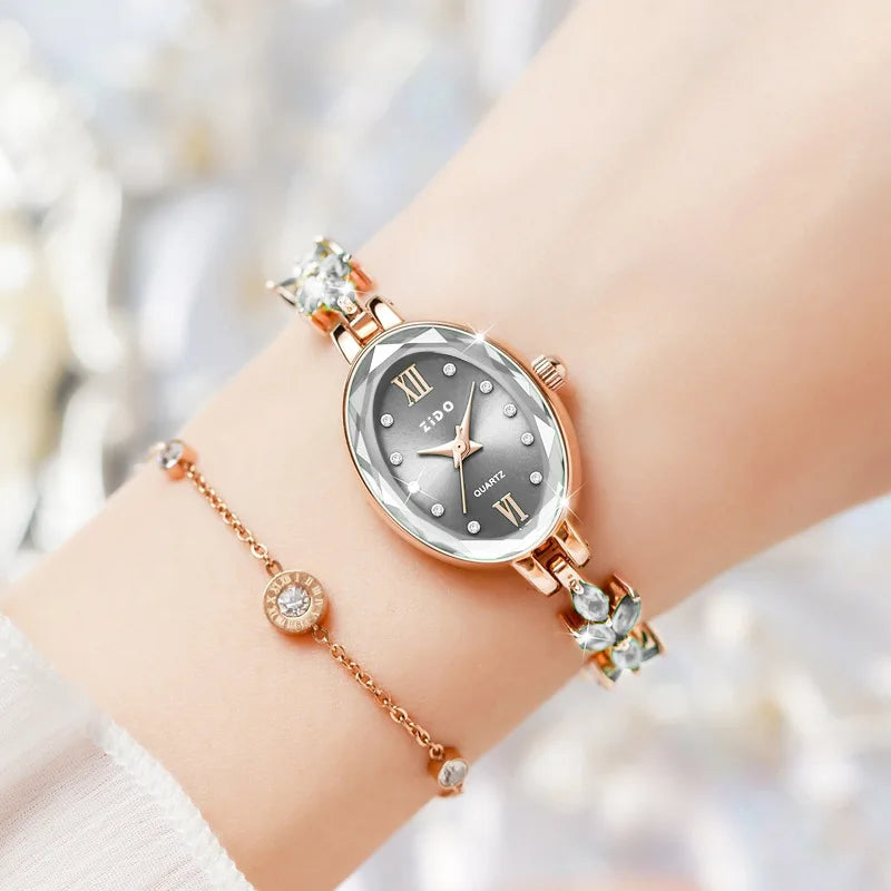 UTHAI V22 Relojes de mujer Lujo ligero Diamantes incrustados Reloj femenino impermeable de cuarzo ovalado de moda para mujer con pulsera
