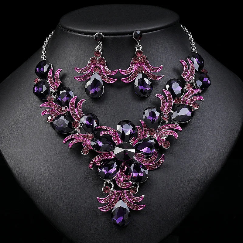 Juego de joyería morada al por mayor Accesorios de boda Lujo Cristal Rhinestone Flor Pendientes y Collar llamativos para mujer