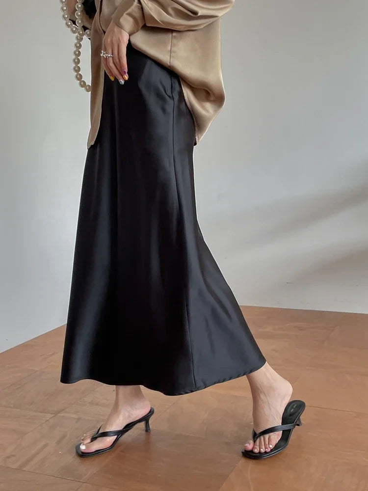 Faldas de satén de seda para mujer estilo coreano color champán para oficina, cintura alta, falda acampanada, moda elegante, falda lápiz larga sólida 2025