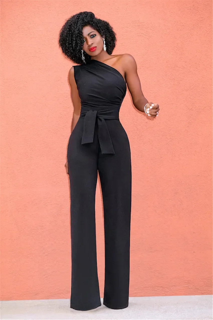 Damejumpsuit Ensfarget Skjev Krage Avskåret Topp Rette Bukser Belte Sexy Ermeløs Løse Bukser Elegant Sjarmerende Playsuits