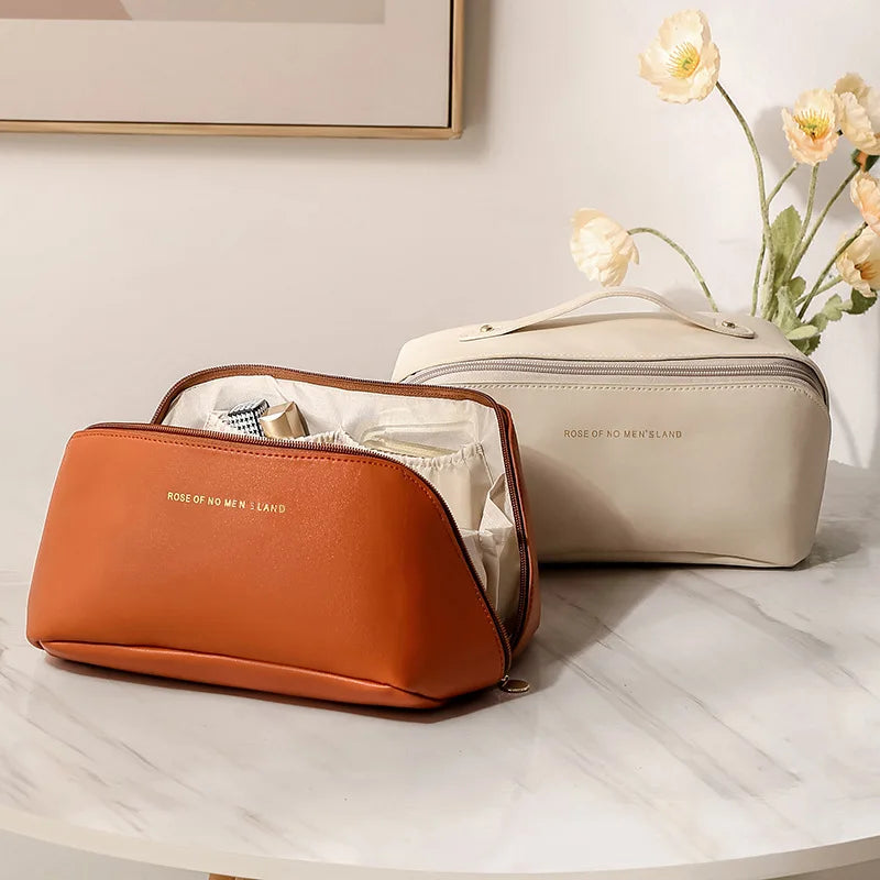 Bolsa de maquillaje PU a la moda y práctica, bolsa de almacenamiento de viaje, neceser de gran capacidad, bolsa de maquillaje con almohadilla de belleza para apoyar la mano