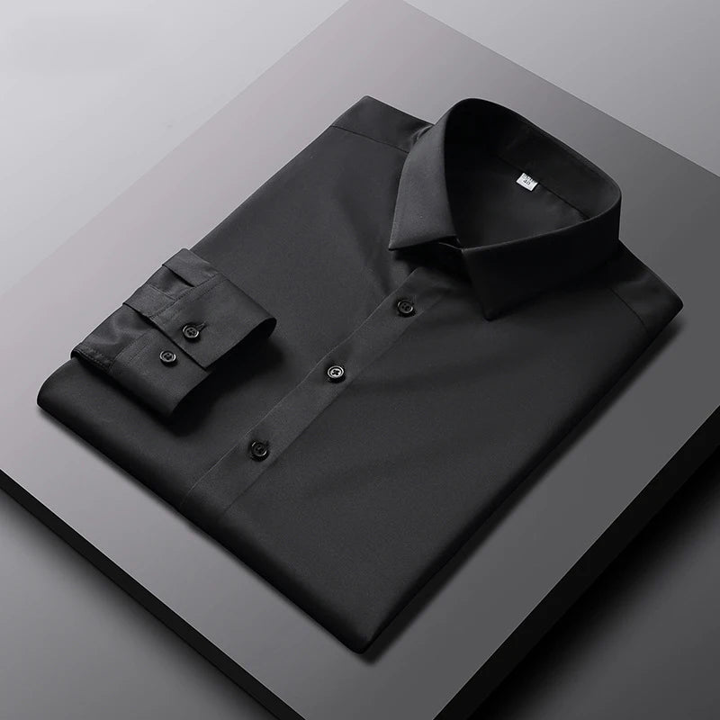 Camisa de manga larga de color liso para hombre, informal y a la moda, que no necesita planchado y es resistente a las arrugas, top de negocios