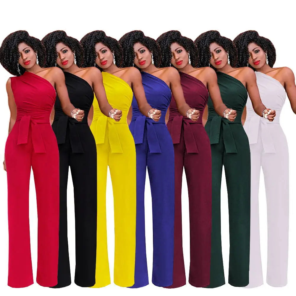 Damejumpsuit Ensfarget Skjev Krage Avskåret Topp Rette Bukser Belte Sexy Ermeløs Løse Bukser Elegant Sjarmerende Playsuits