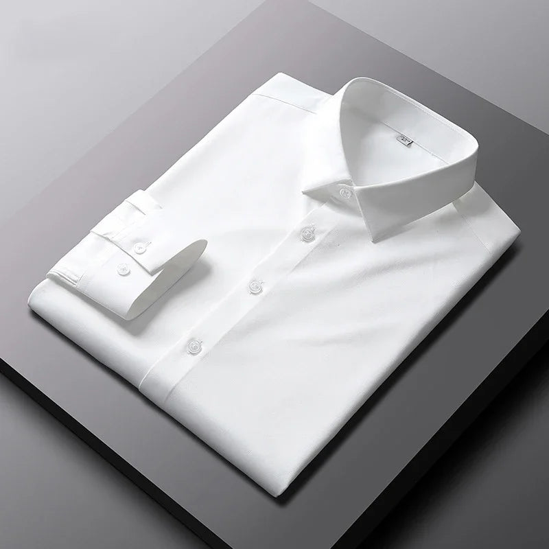 Camisa de manga larga de color liso para hombre, informal y a la moda, que no necesita planchado y es resistente a las arrugas, top de negocios