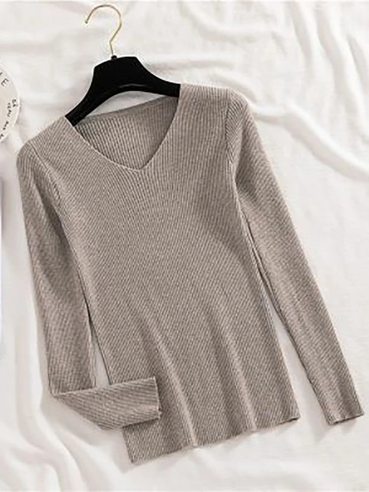 Suéter de mujer nuevo otoño invierno de manga larga jersey básico top de moda cuello en V elástico femenino invierno de punto sólido