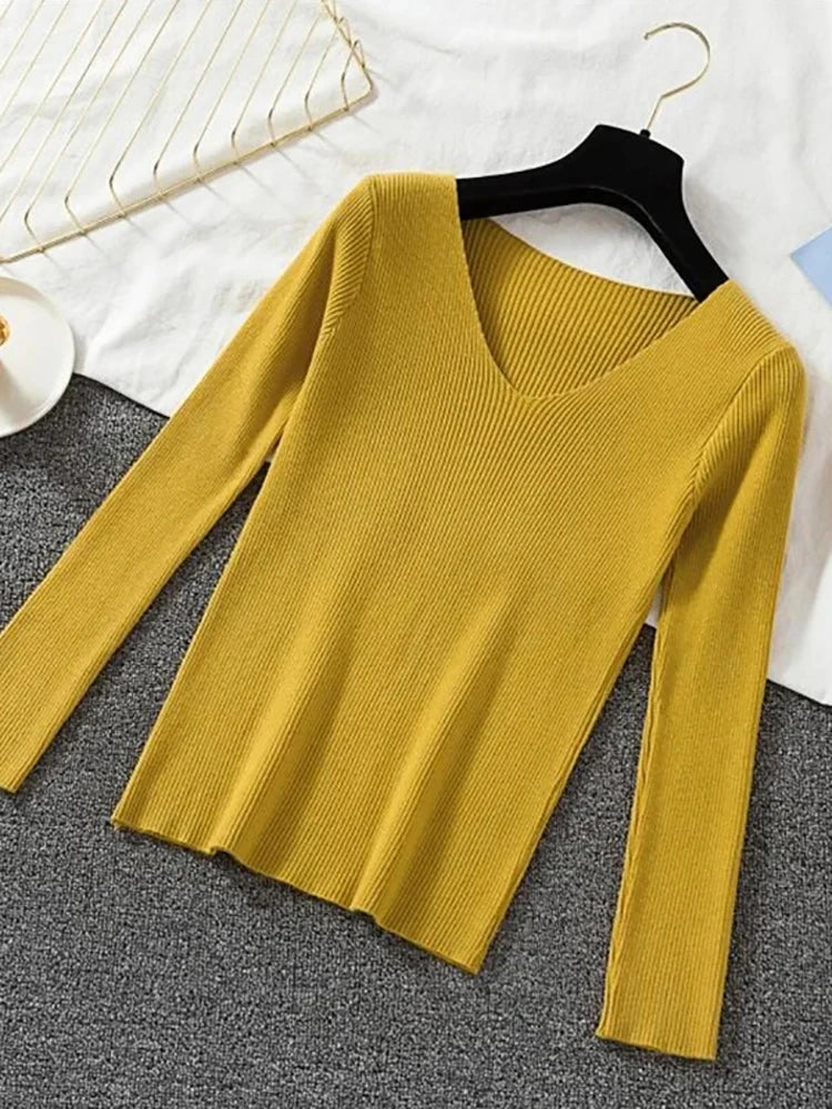 Suéter de mujer nuevo otoño invierno de manga larga jersey básico top de moda cuello en V elástico femenino invierno de punto sólido