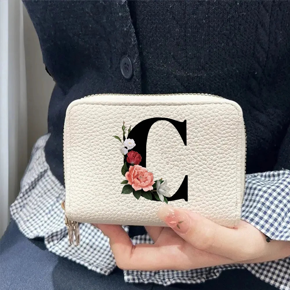 Cartera corta con estampado floral y letras