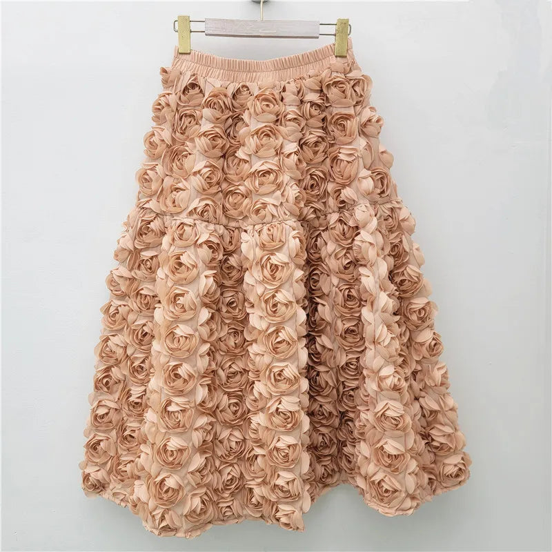 Falda para mujer Verano 2025 Versátil Flor tridimensional Falda a media pantorrilla Cintura alta Gran vuelo Moda Faldas largas estilo A