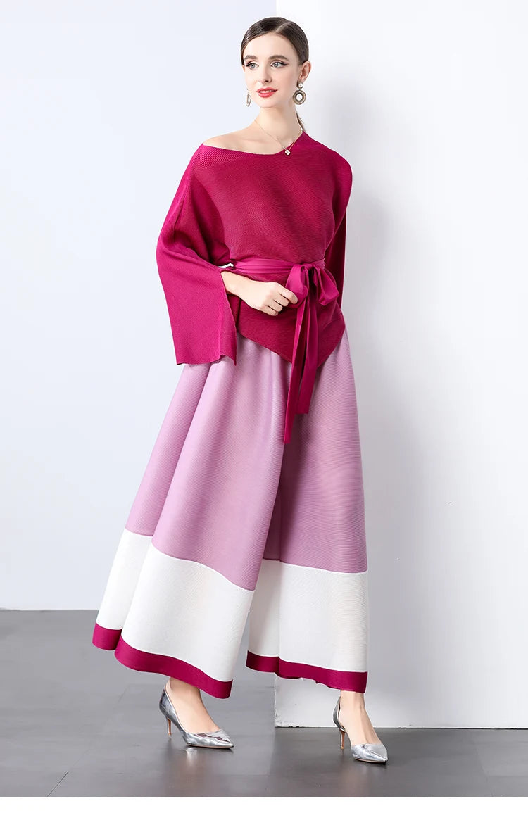 Conjunto de dos piezas de moda femenina para primavera, top suelto plisado irregular con retazos y cinturón, y pantalones de pierna ancha Miyake 2024