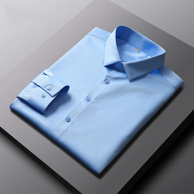 Camisa de manga larga de color liso para hombre, informal y a la moda, que no necesita planchado y es resistente a las arrugas, top de negocios