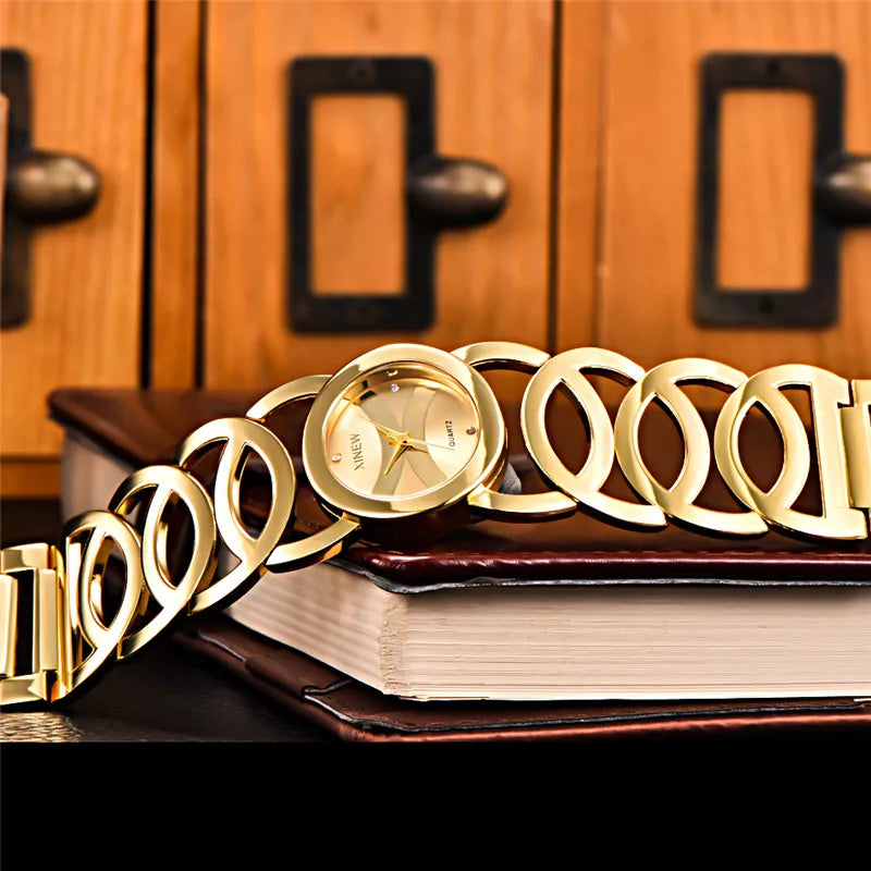 Mujeres Marca Grande Original XINEW 6438 Relojes Señoras Casual Dorado Lujo Cuarzo Pulsera Reloj Relogios Feminino Modas 2024