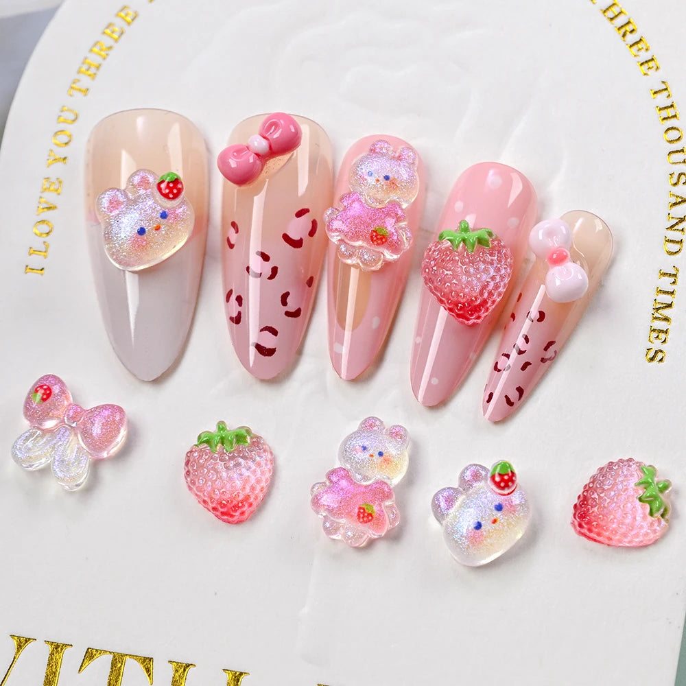 50 dijes de uñas de conejo fresa Kawaii, lazo, brillos, pajarita rosa, cinta de conejo, diamantes de imitación de uñas, piezas de uñas de conejo de dibujos animados de resina
