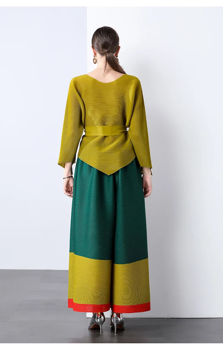 Conjunto de dos piezas de moda femenina para primavera, top suelto plisado irregular con retazos y cinturón, y pantalones de pierna ancha Miyake 2024