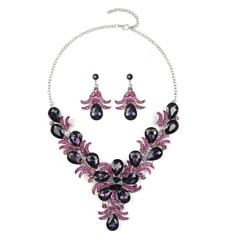 Juego de joyería morada al por mayor Accesorios de boda Lujo Cristal Rhinestone Flor Pendientes y Collar llamativos para mujer