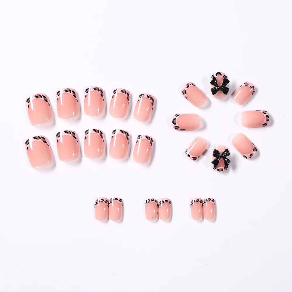 Uñas postizas de leopardo rosa de 24 piezas con punta francesa, cabeza cuadrada corta, lazo negro 3D, uñas postizas acrílicas de cobertura completa a presión