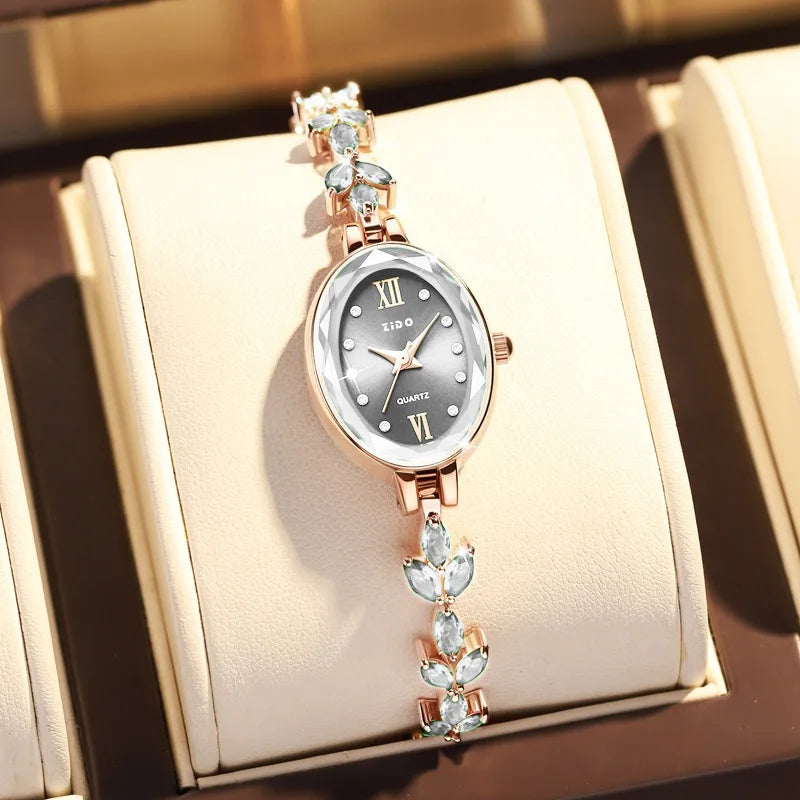UTHAI V22 Relojes de mujer Lujo ligero Diamantes incrustados Reloj femenino impermeable de cuarzo ovalado de moda para mujer con pulsera
