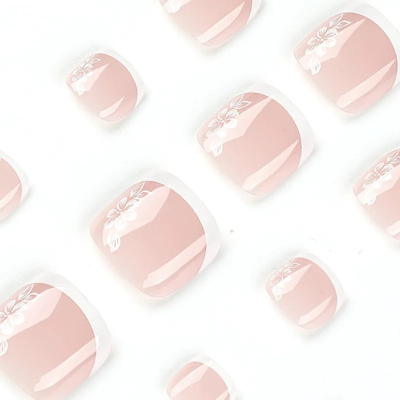 Flores Blancas Uñas Postizas Artificiales Francesas Nude Rosa Uñas Falsas para Pies con Pegamento Uñas Postizas Cortas Planas para Pies al por Mayor