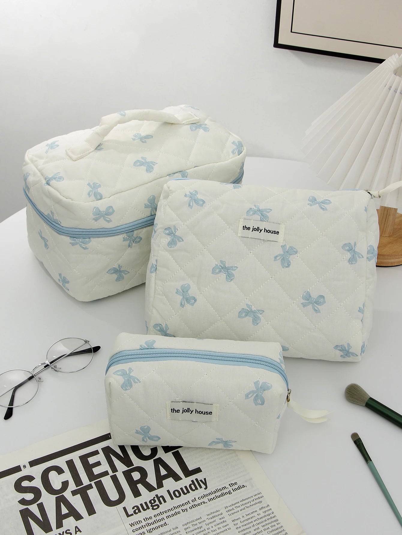 1 pc/set of white and blue bow quilted makeup bag, bow pattern makeup bag, travel essential makeup bag, daily toiletries makeup