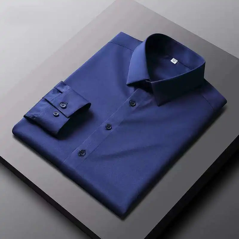 Camisa de manga larga de color liso para hombre, informal y a la moda, que no necesita planchado y es resistente a las arrugas, top de negocios