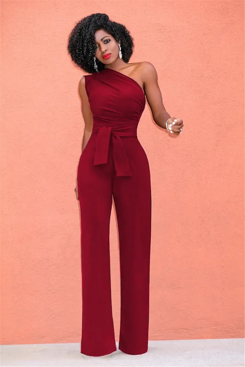 Damejumpsuit Ensfarget Skjev Krage Avskåret Topp Rette Bukser Belte Sexy Ermeløs Løse Bukser Elegant Sjarmerende Playsuits