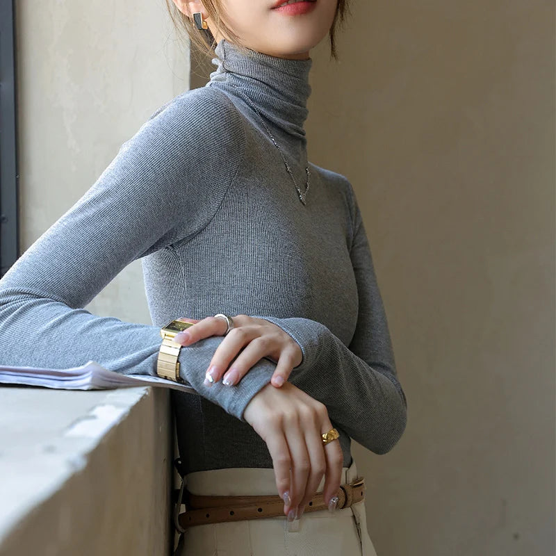 Otoño Nuevo cuello alto básico suéteres de punto gama alta sentido temperamento manga larga suéteres moda Slim Fit blusas interiores