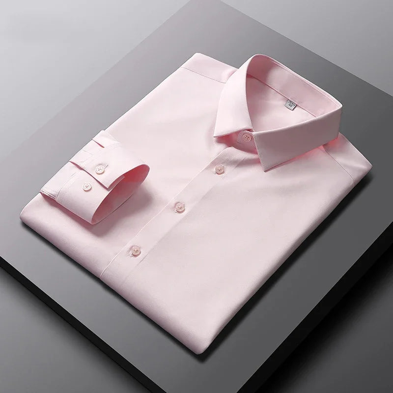 Camisa de manga larga de color liso para hombre, informal y a la moda, que no necesita planchado y es resistente a las arrugas, top de negocios