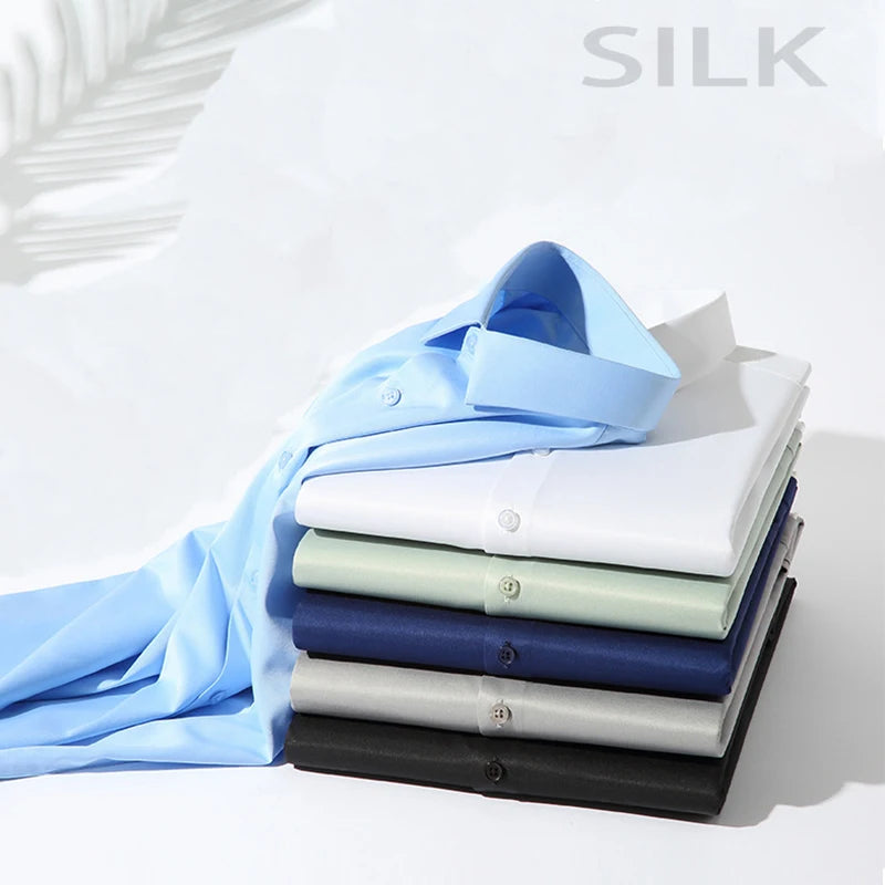 Camisa de manga larga de color liso para hombre, informal y a la moda, que no necesita planchado y es resistente a las arrugas, top de negocios